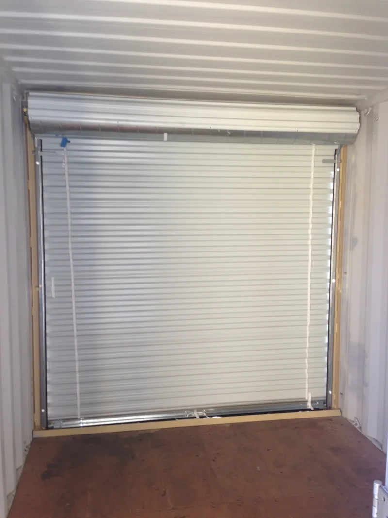 20ft custom one trip shipping container – roller shutter & ral 7035 respray