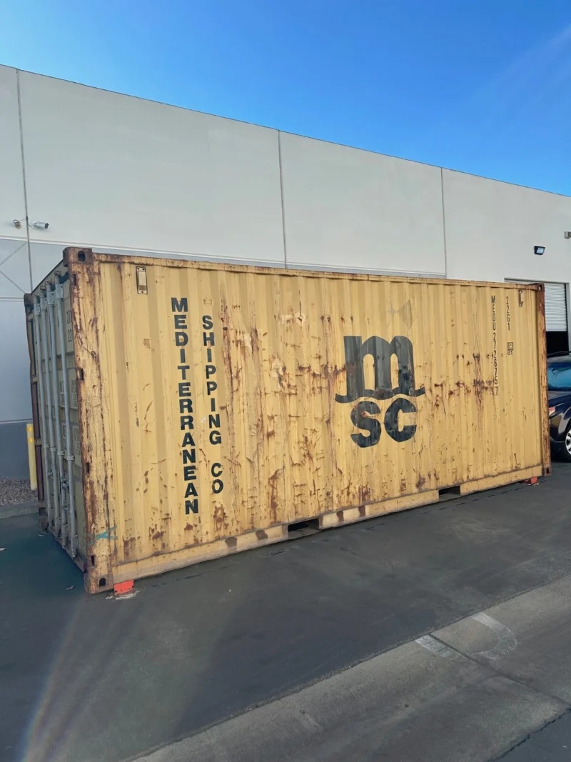 used 20ft conex shipping / storage container – yellow/gold