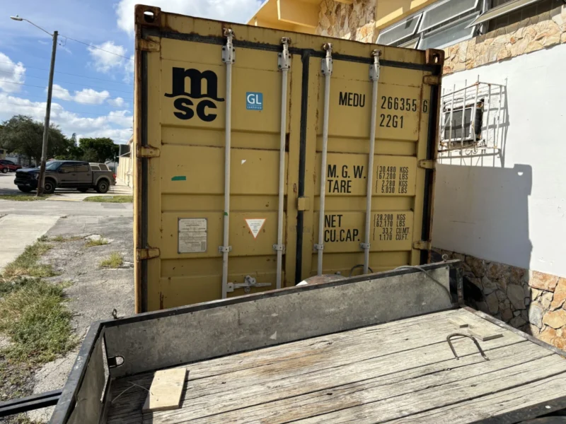 used 20ft conex shipping / storage container – yellow/gold