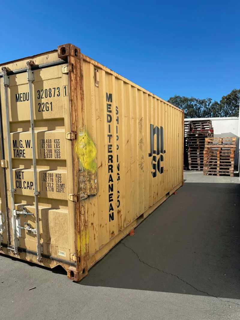 used 20ft conex shipping / storage container – yellow/gold